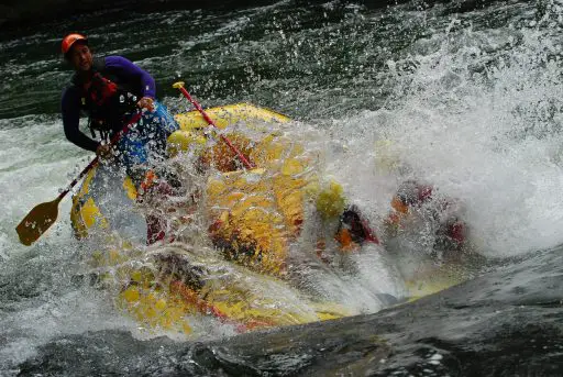 A small inflatable raft sinking in white-water rapids. Investing in Bitcoin during the crypto crash can feel like a similar sort of extreme sport.
