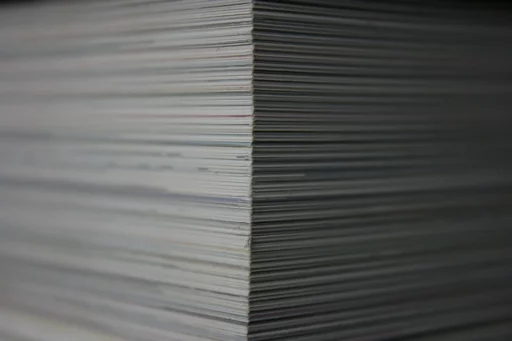 A large pile of paper documents.